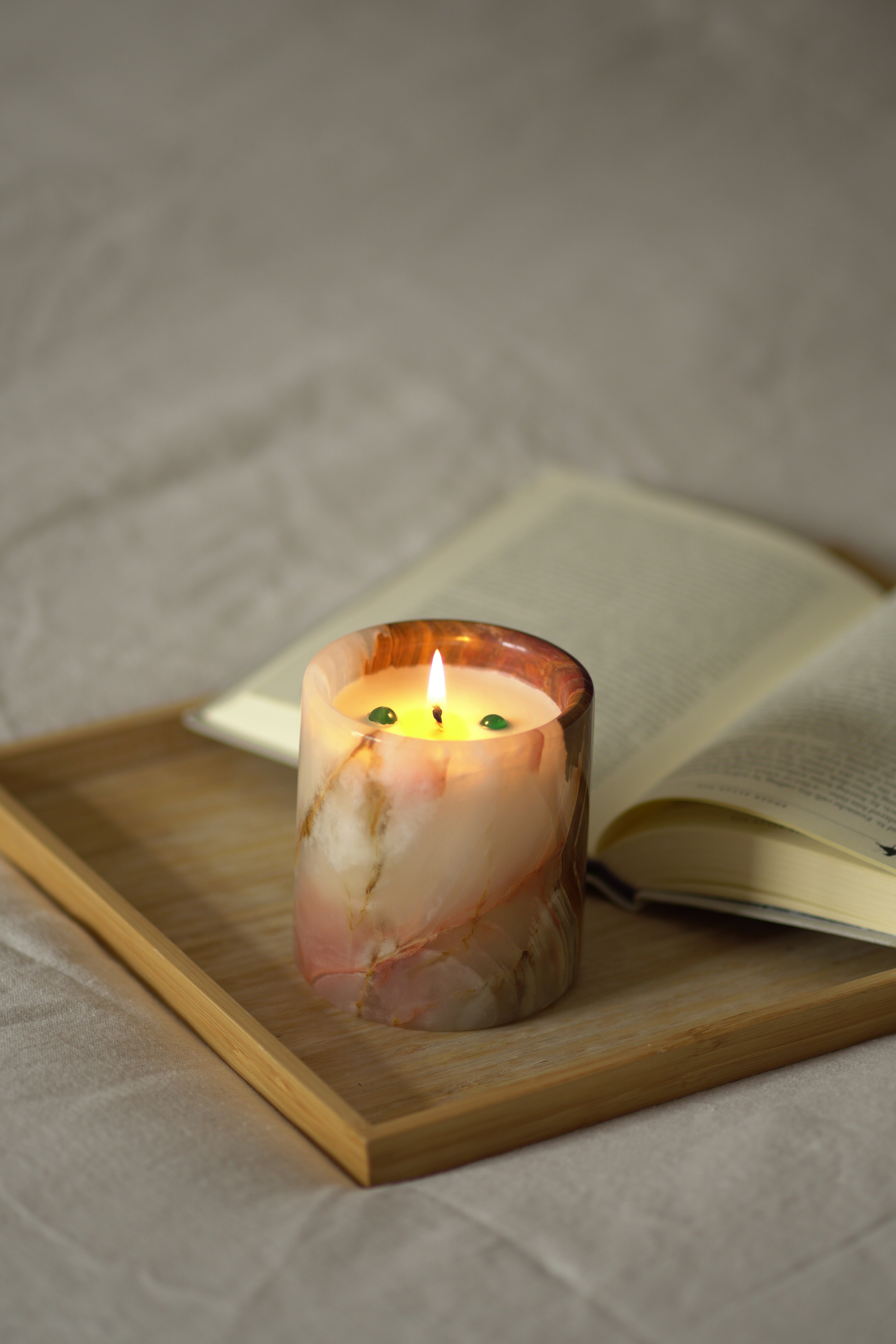 Candle in a Onyx holder with a blurred background